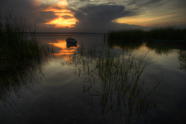 Artem Nosenko: boat sun water shore